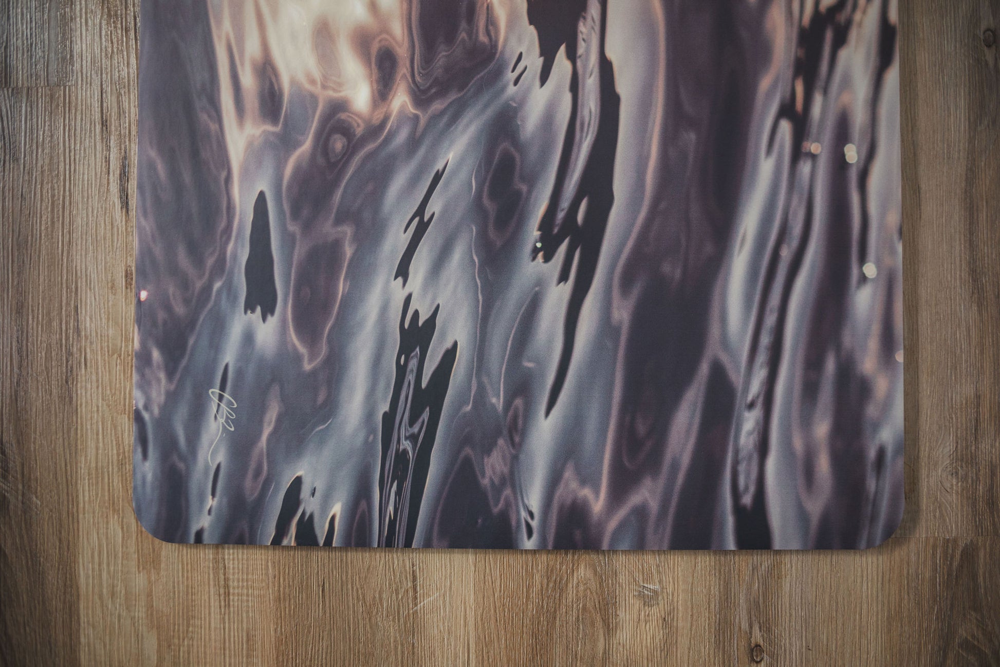 Marbled surface mat on a wooden floor
