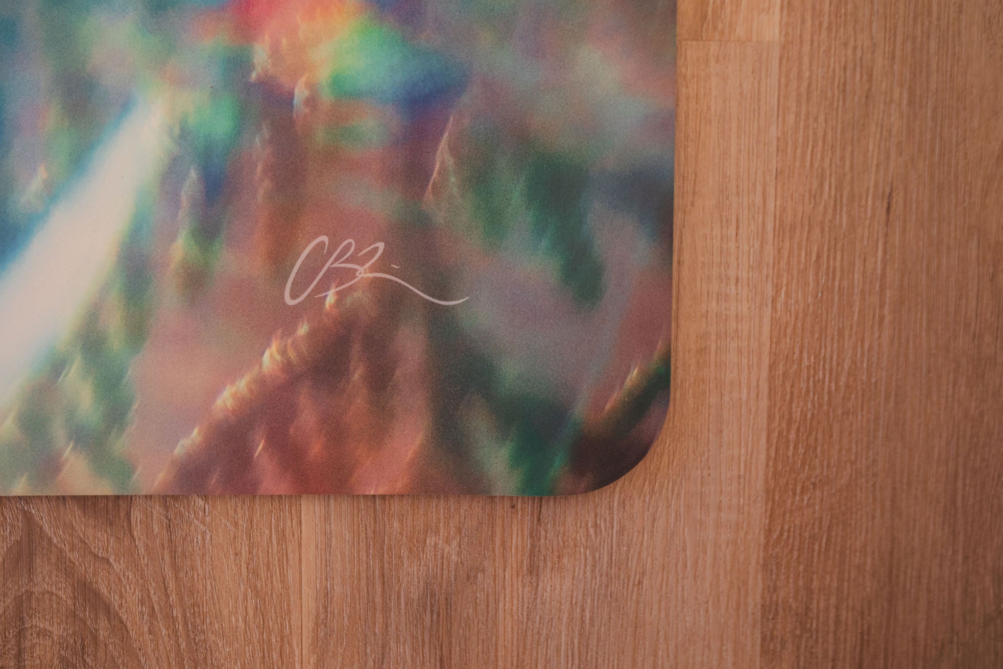 Colorful abstract design on a wooden surface